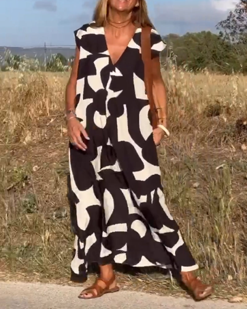 Robe chic et fluide Stéphanie de Danoir Paris, vêtement élégant noir avec coupe fluide et détails sophistiqués.