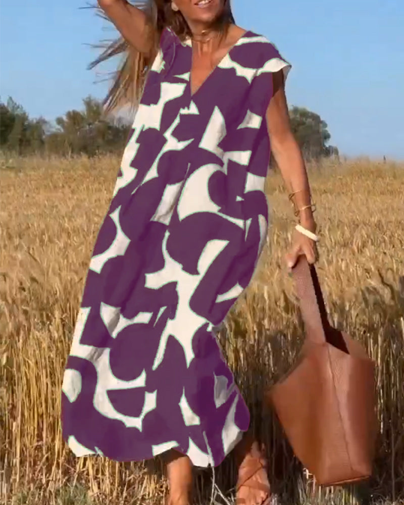 Robe chic et fluide Stéphanie de Danoir Paris, en tissu noir élégant, portée et vue de face.
