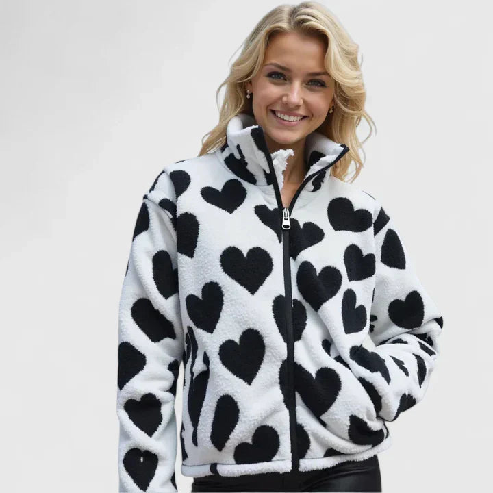 Veste élégante Vea™ de Danoir Paris en noir, tissu sophistiqué avec boutonnière et détails modernes, vue de face.