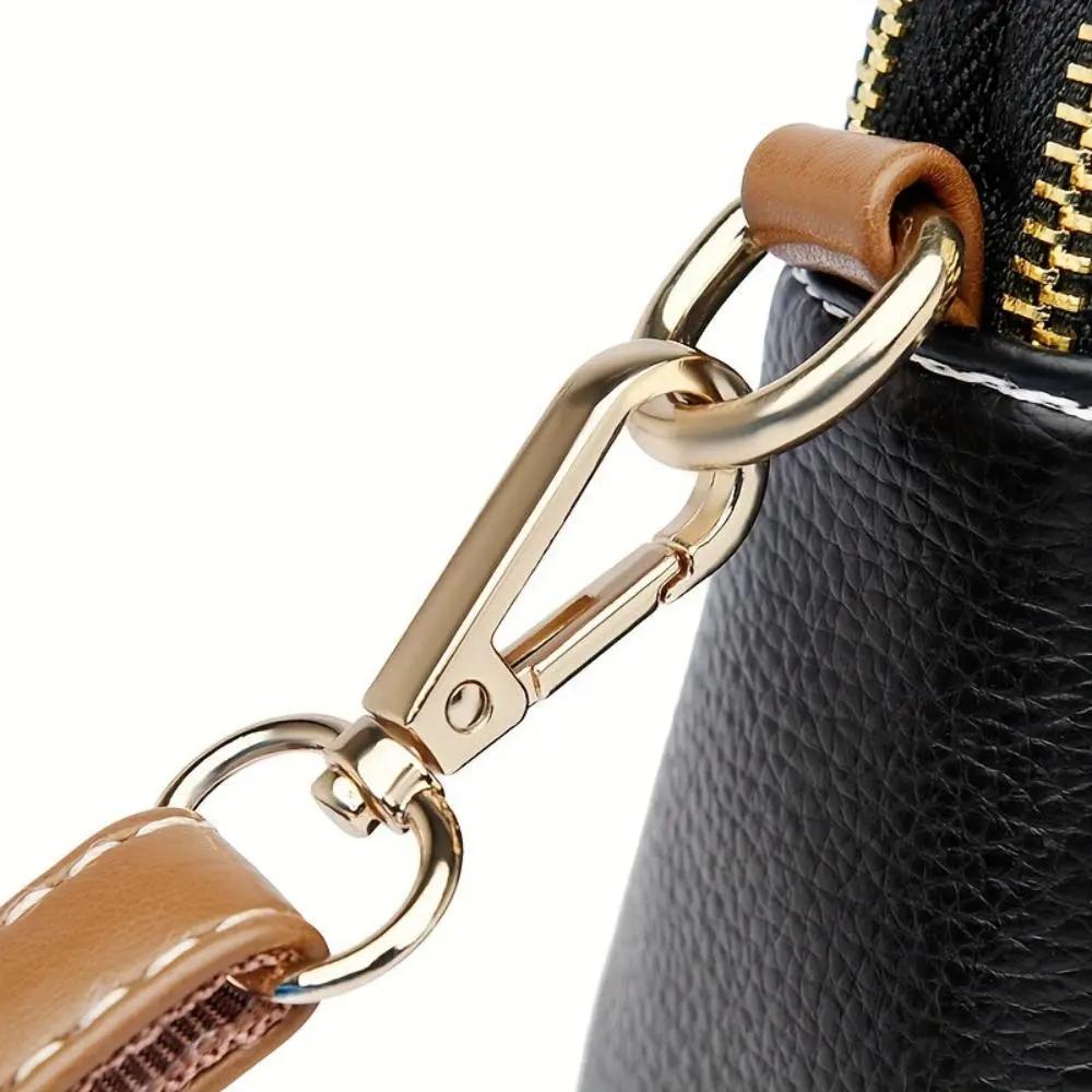 Sac bandoulière noir Sienna de Danoir Paris, élégant et confortable, avec détails en cuir et design moderne.