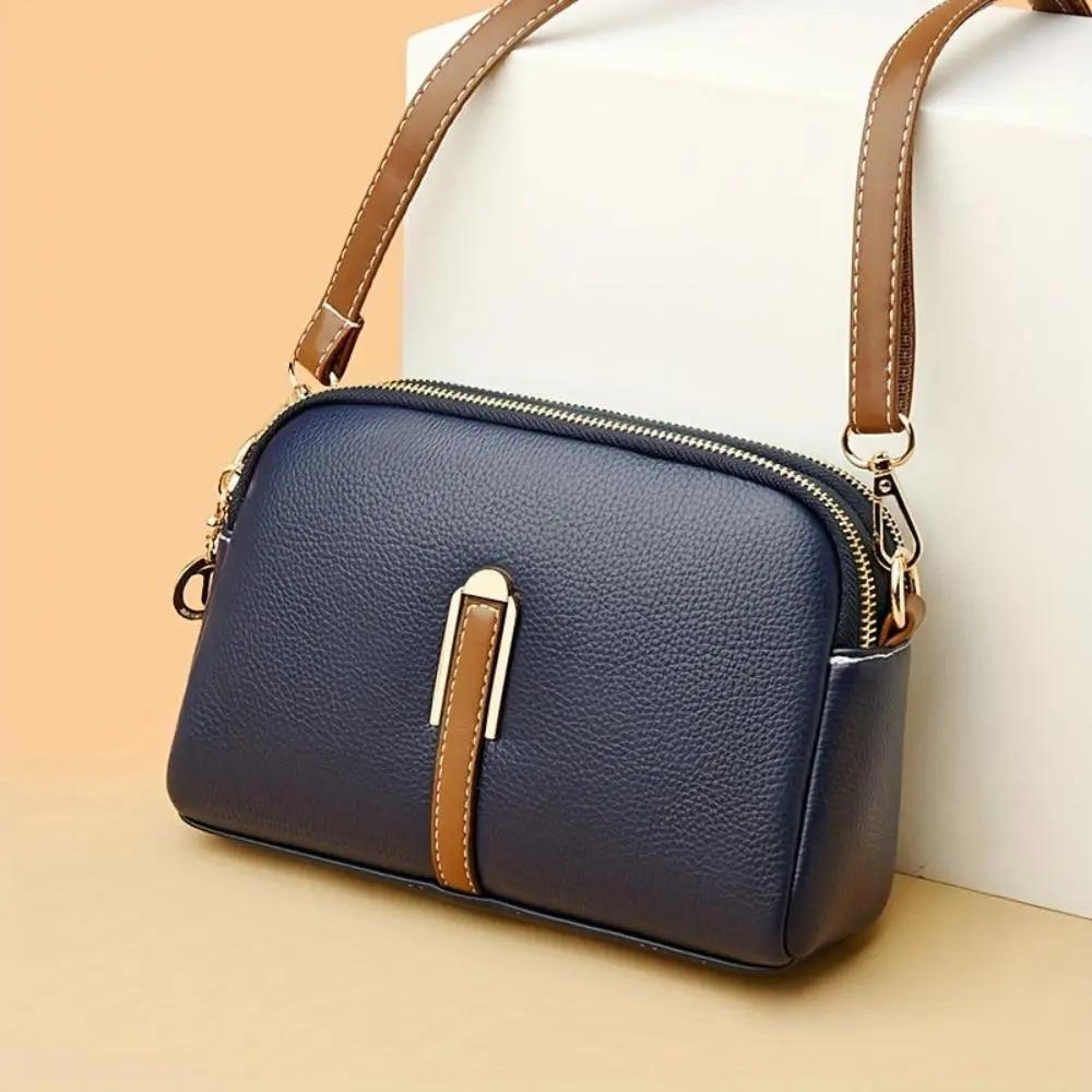 Sac bandoulière Sienna de Danoir Paris, en noir, avec design confortable et élégant, idéal pour un style casual.