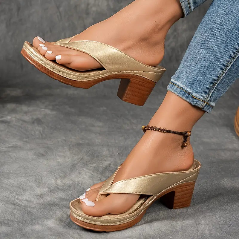 Sandales Danoir Paris élégantes et confortables, en cuir noir, avec semelle douce et design sophistiqué pour femme.