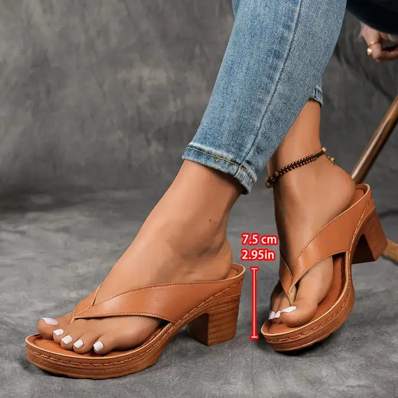 Sandales Danoir Paris élégantes et confortables, en cuir noir, avec design raffiné pour femmes.