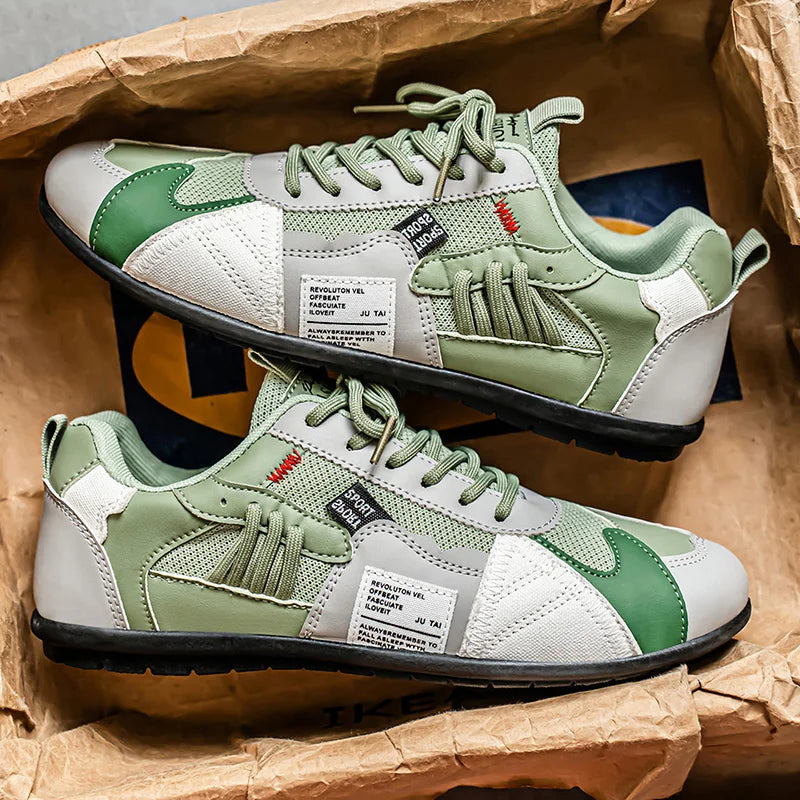 Sneakers rétro colorées Giovanni de Danoir Paris, orange avec détails vifs, en toile, vue de côté.