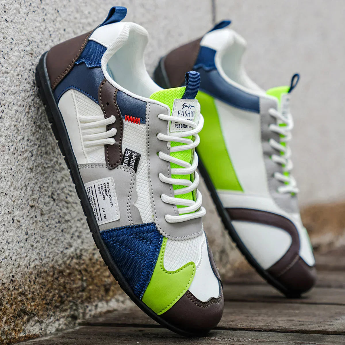 Sneakers rétro colorées Giovanni de Danoir Paris, chaussures de sport orange avec design vintage, vue de face.