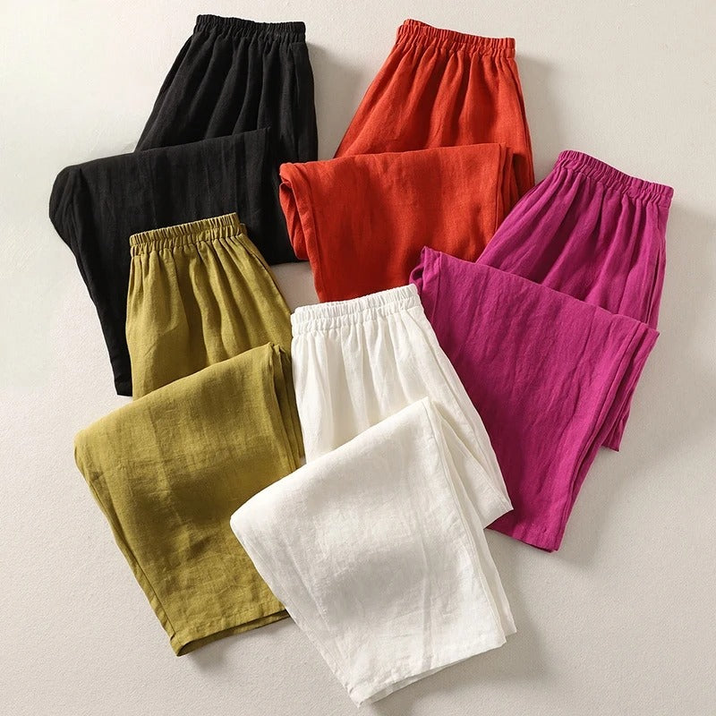 Pantalon fluide Amalia™ en coton et lin de Danoir Paris, en orange, porté, avec taille élastique et coupe décontractée.