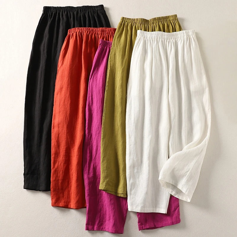 Pantalon fluide Amalia™ en coton et lin de Danoir Paris, couleur orange, porté en mode décontracté.