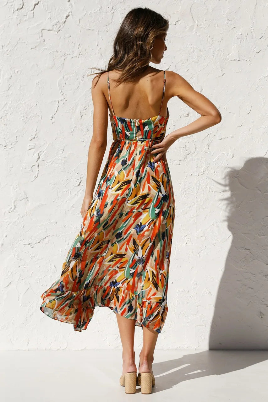 Robe fluide orange élégante de la marque Danoir Paris, design sophistiqué et tissu léger pour un look chic et confortable.