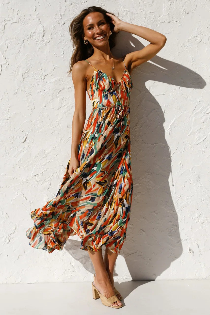 Robe fluide orange Danoir Paris Serene, élégante et légère, portée avec des détails fluides et sophistiqués.