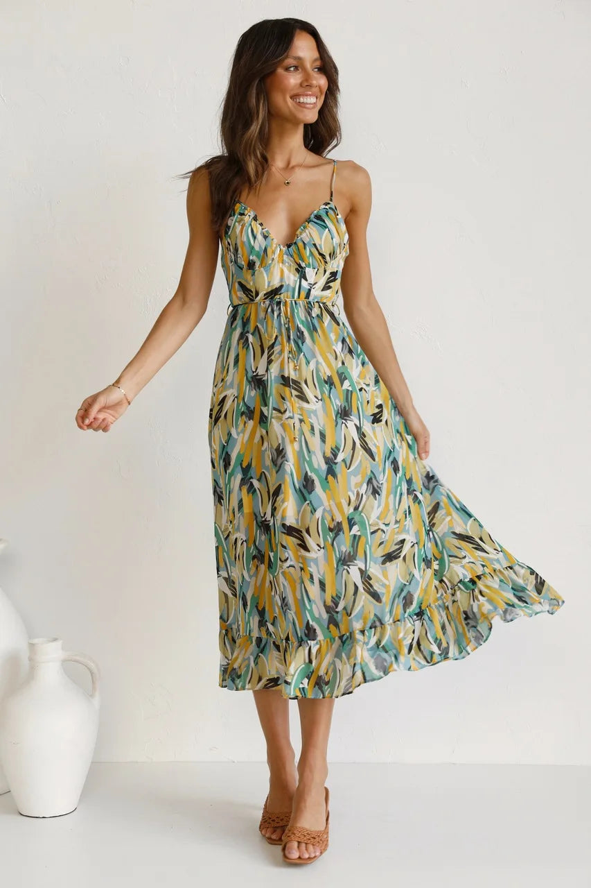 Robe fluide orange élégante de la marque Danoir Paris, vue en détail sur le produit Serene.