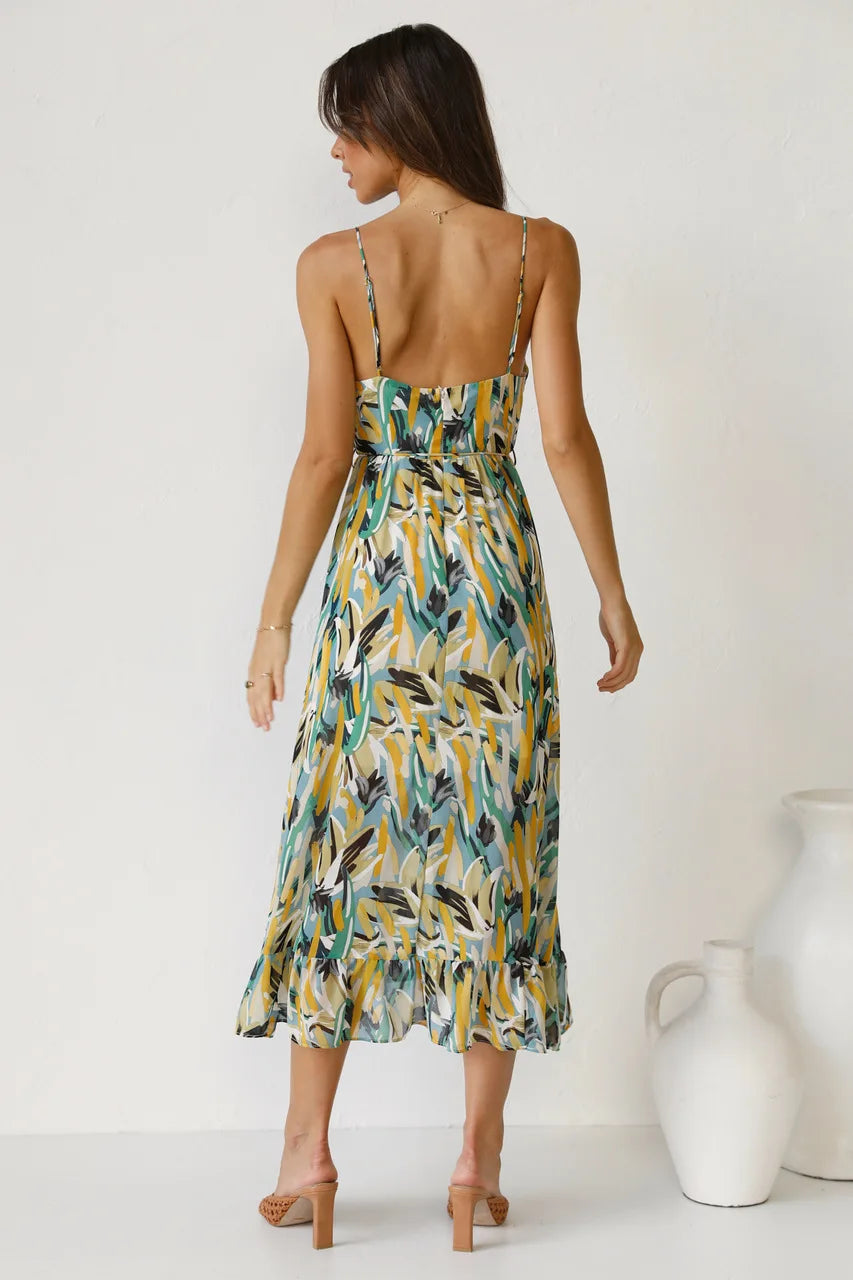Robe fluide orange élégante de la marque Danoir Paris, parfaite pour un look sophistiqué et féminin.