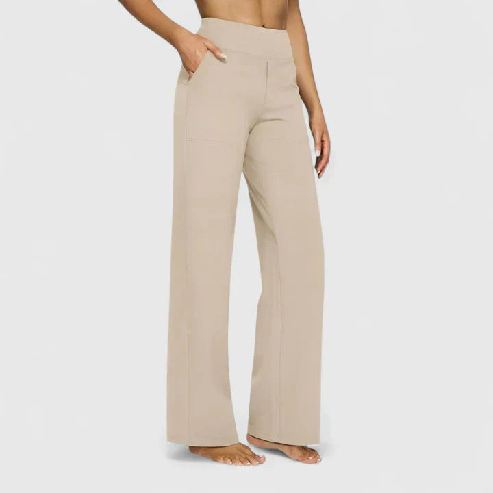 Pantalons élégants taupe Danoir Paris, vue de face, tissu fluide et coupe sophistiquée, parfait pour une tenue chic.