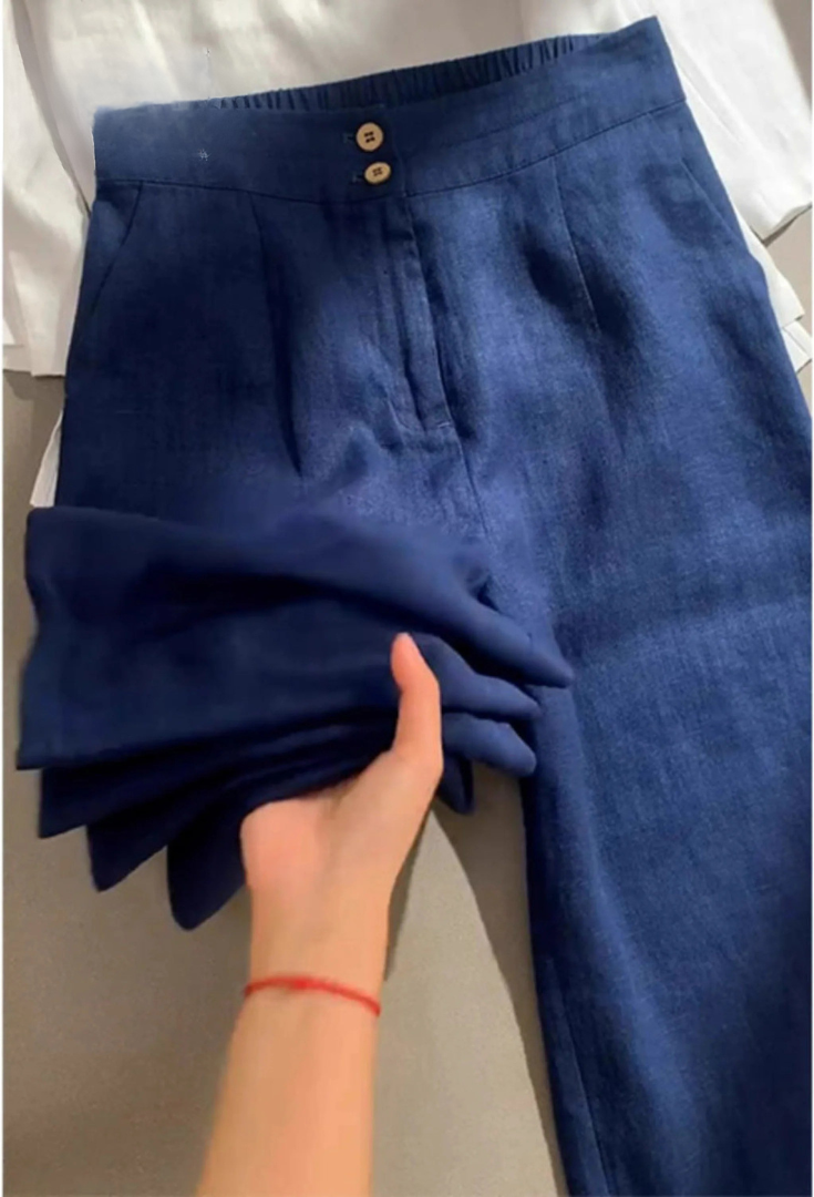 Pantalon Maia en lin de Danoir Paris, couleur abricot, avec coupe décontractée et détails élégants.