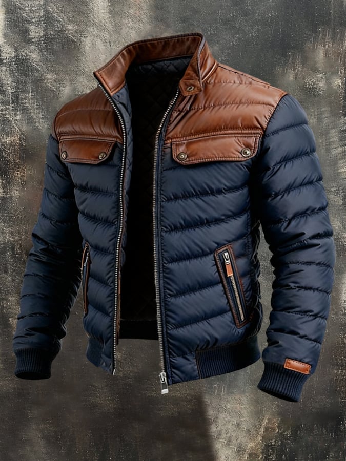 Veste matelassée bleu marine Danoir Paris avec empiècements en cuir, style élégant et chaud, pour femme.