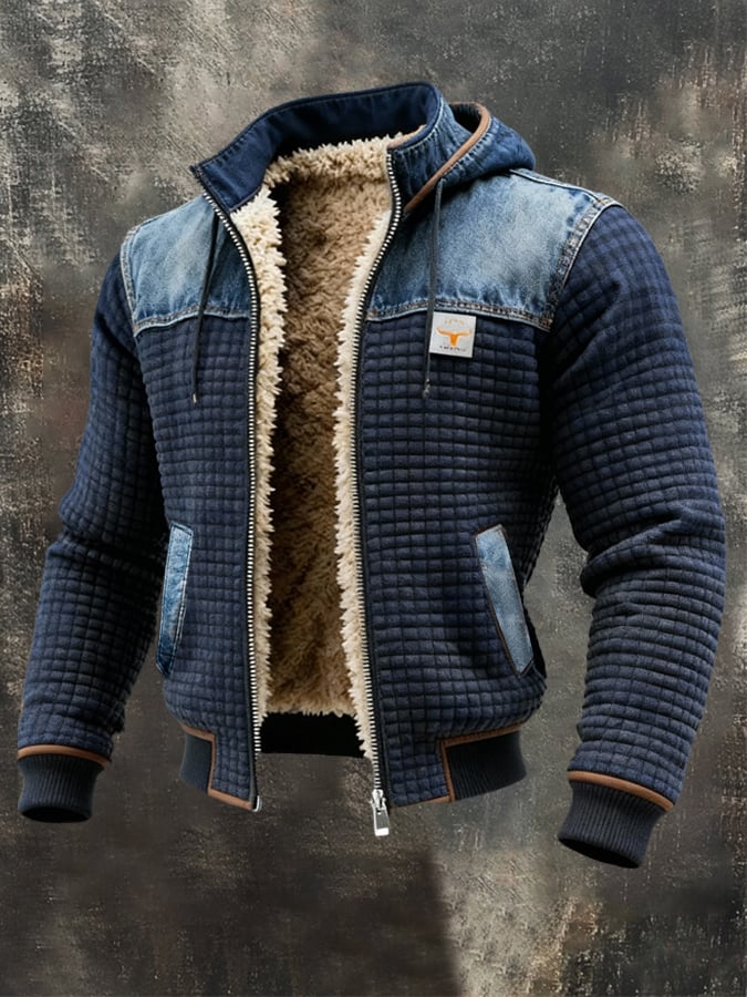 Veste matelassée bleu marine de Maison Clément Paris avec détails en jean, élégante et moderne, par Danoir Paris Paris.