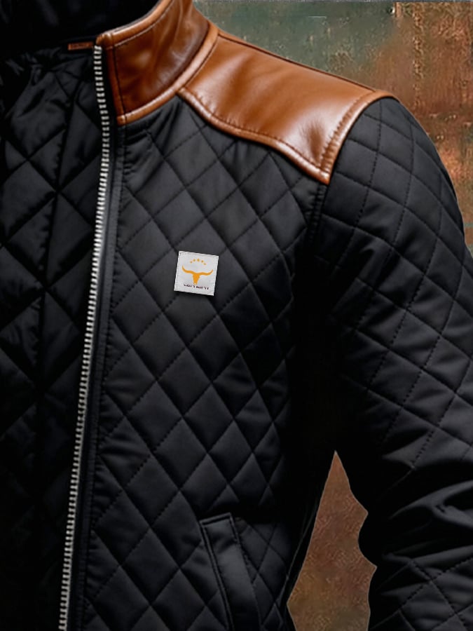 Veste matelassée noire Danoir Paris avec épaules en cuir, style élégant et tendance pour femme.