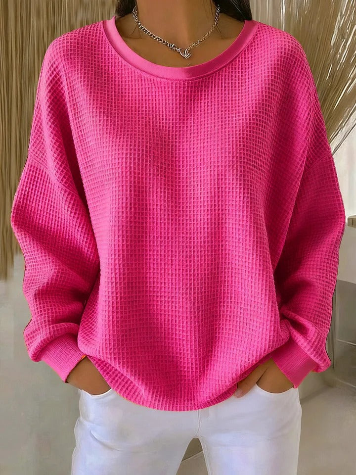 Pull classique LUCILLE de Danoir Paris en rose, vue de face, doux et confortable, en laine ou coton, détail de la texture.