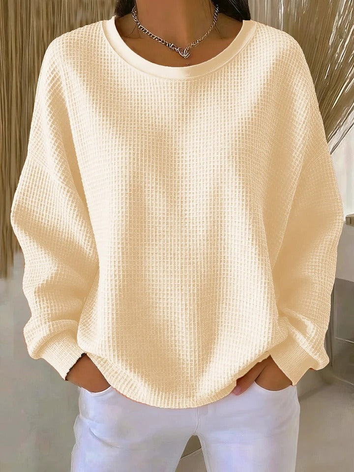 Pull classique rose LUCILLE de Danoir Paris, doux et confortable, avec un col rond et manches longues.