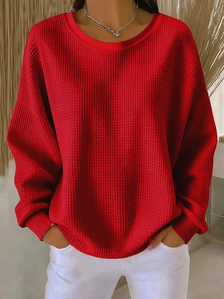 Pull classique rose Danoir Paris Lucille, doux et confortable, porté sur un mannequin, détail du col et des manches.