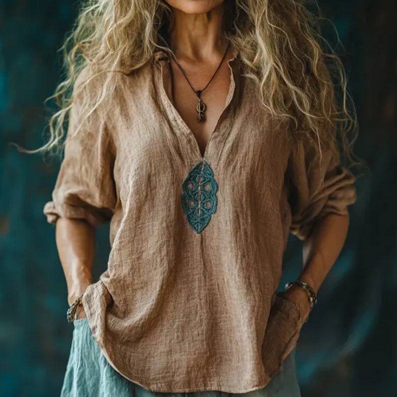 Blouse décontractée élégante Nina de Danoir Paris avec rayures bleues, manches longues et coupe fluide.