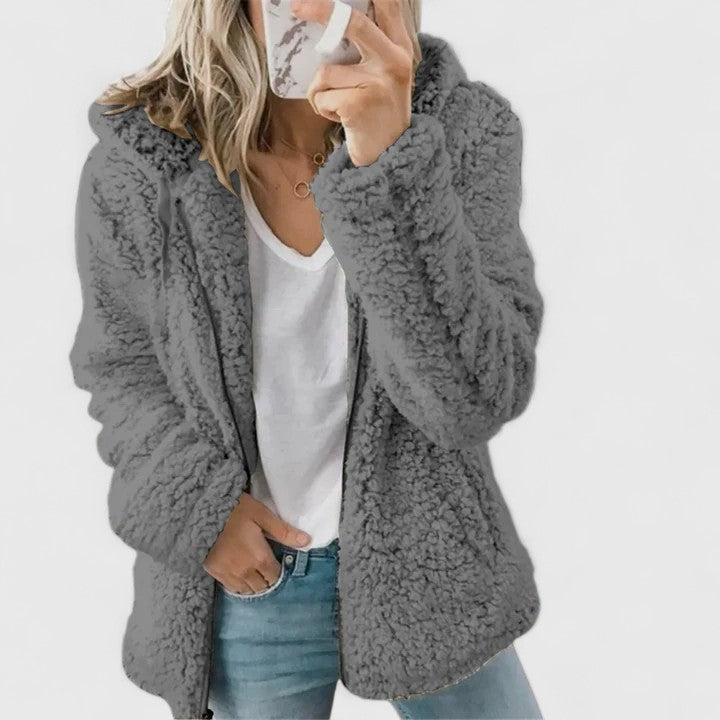 Veste confortable Danoir Paris Hylenyahh en rose fluo avec capuche, tissu doux et ajusté, idéale pour un style décontracté.