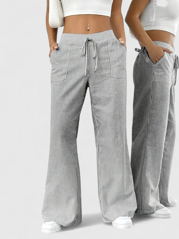 Pantalon large élégant Dominique de Danoir Paris, coupe fluide, tissu léger, coloris rose, porté sur un mannequin.