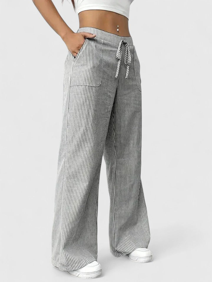 Pantalon large élégant Dominique de Danoir Paris en tissu fluide rose, vue de face sur mannequins.