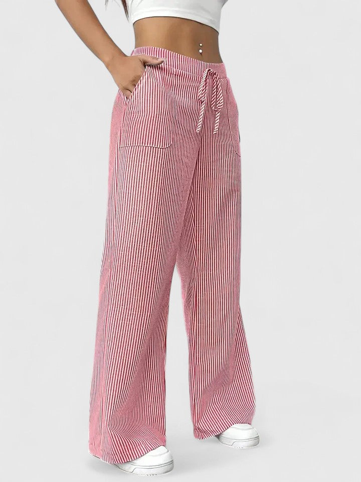 Pantalon large élégant Dominique de Danoir Paris en tissu rose, vue de face, détails de coupe sophistiquée.
