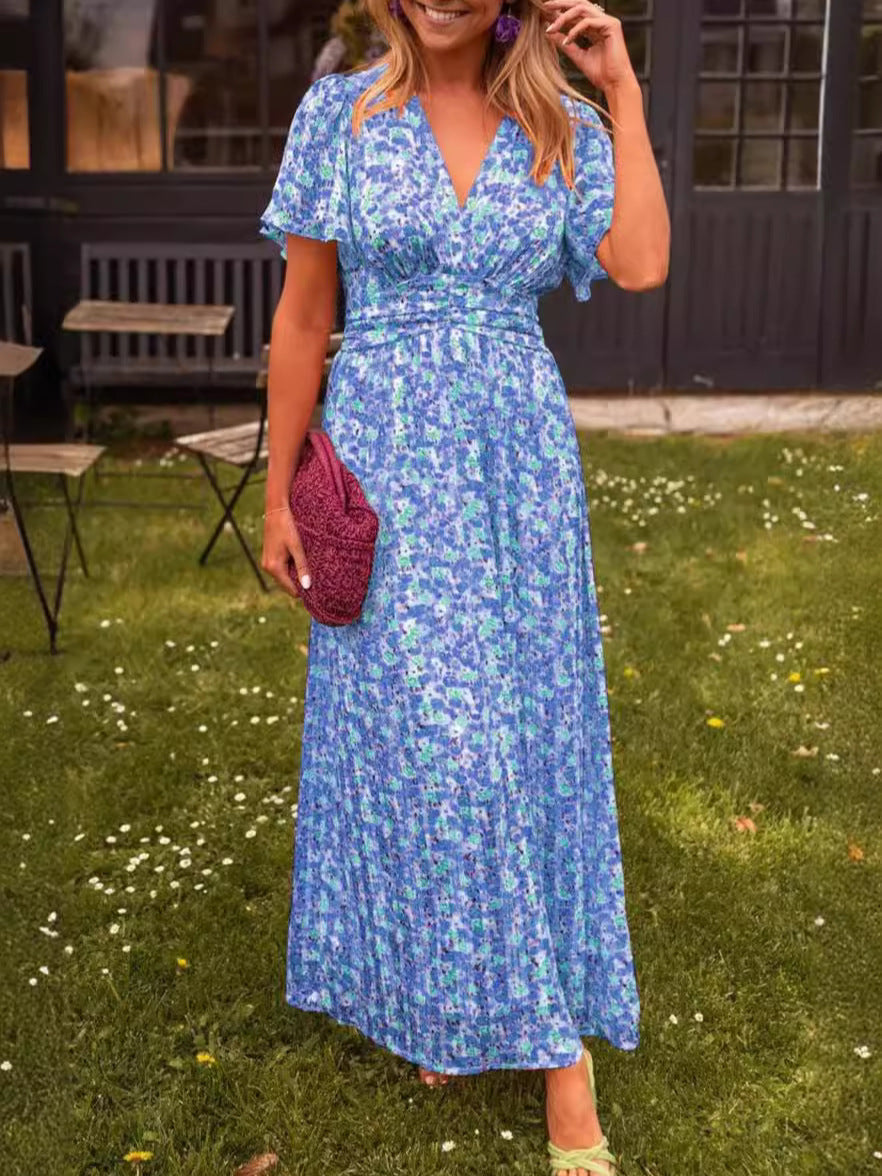 Robe longue fluide fleurie Élina de Danoir Paris avec motif floral élégant et tissu léger.