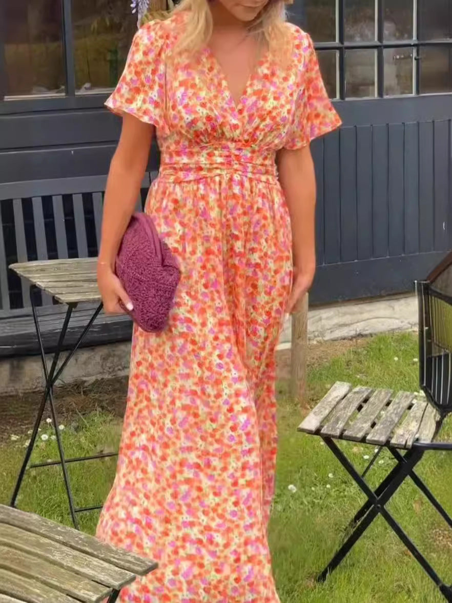Robe longue fluide fleurie Élina de Danoir Paris, tissu léger avec motif floral, portée élégante et féminine.