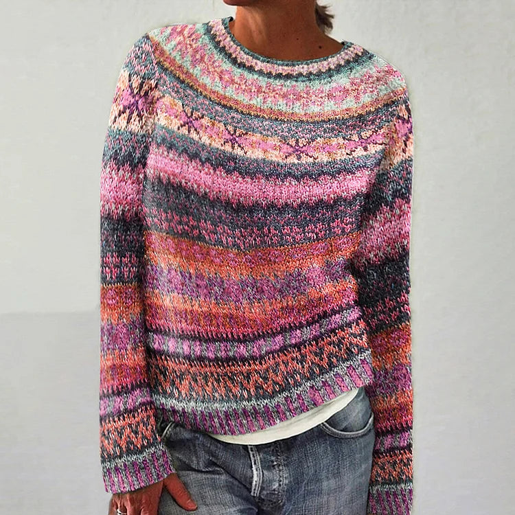 Pull vintage élégant Isabella de Danoir Paris en rose, douceur et style sophistiqué visible sur l'image.