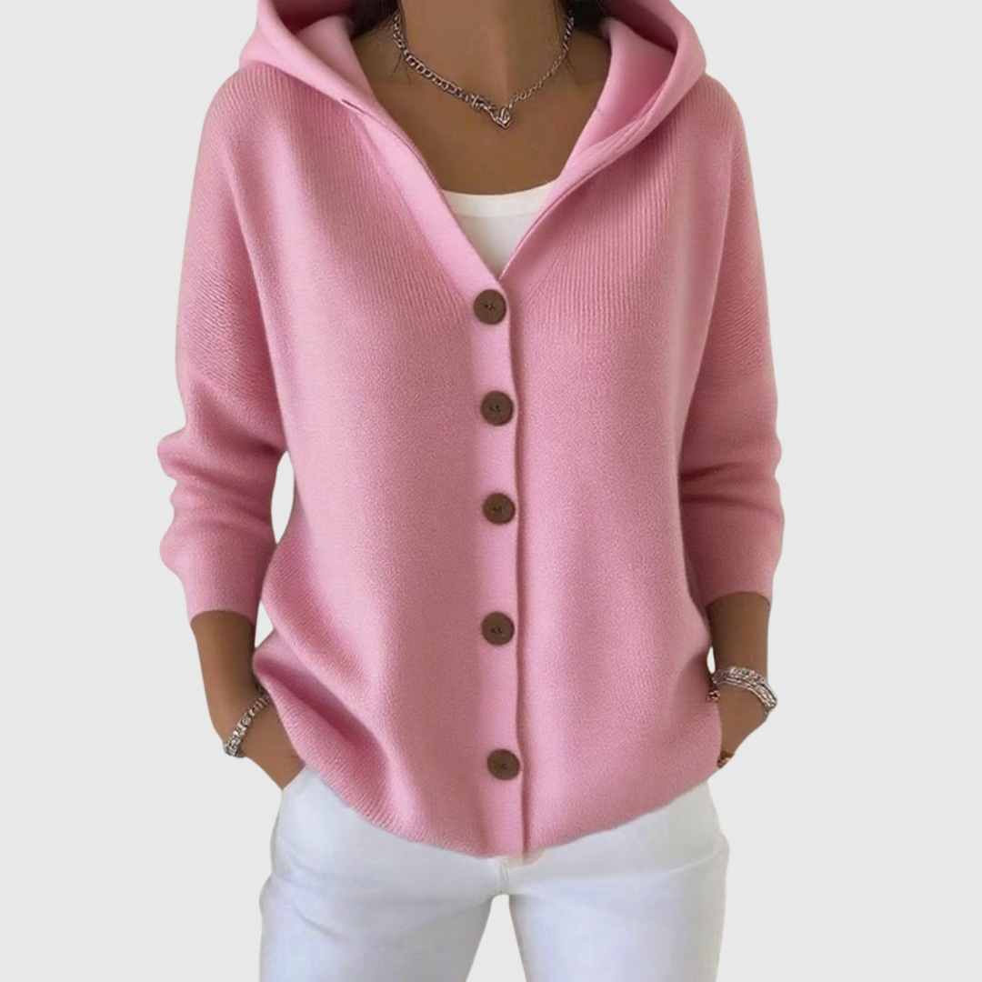 Cardigan élégant Joyce de Danoir Paris en rose, finition douce et style sophistiqué visible sur l'image.