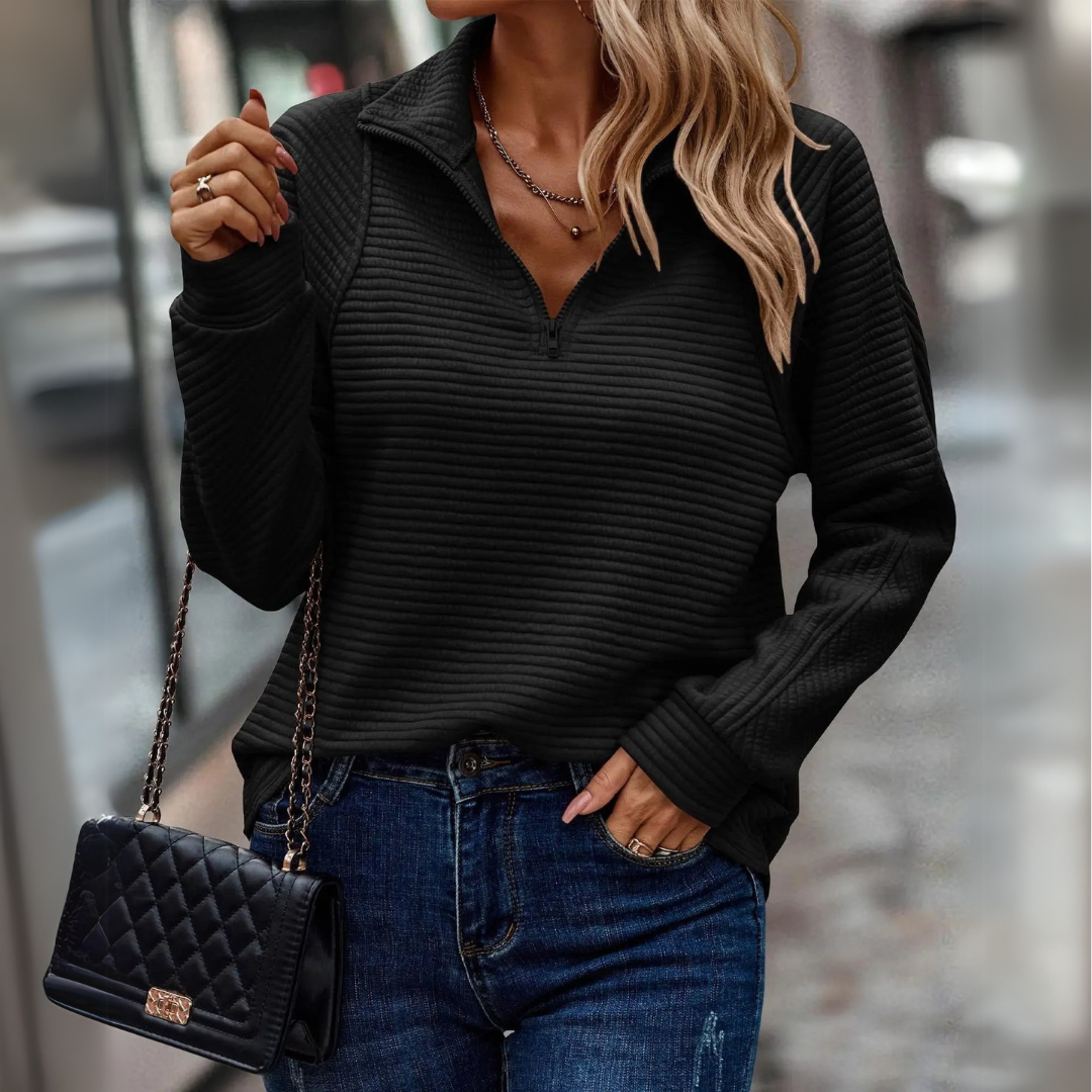 Pull Suzanne Danoir Paris rose avec détail demi-zip, tissu doux et coupe élégante, portée décontractée ou chic.