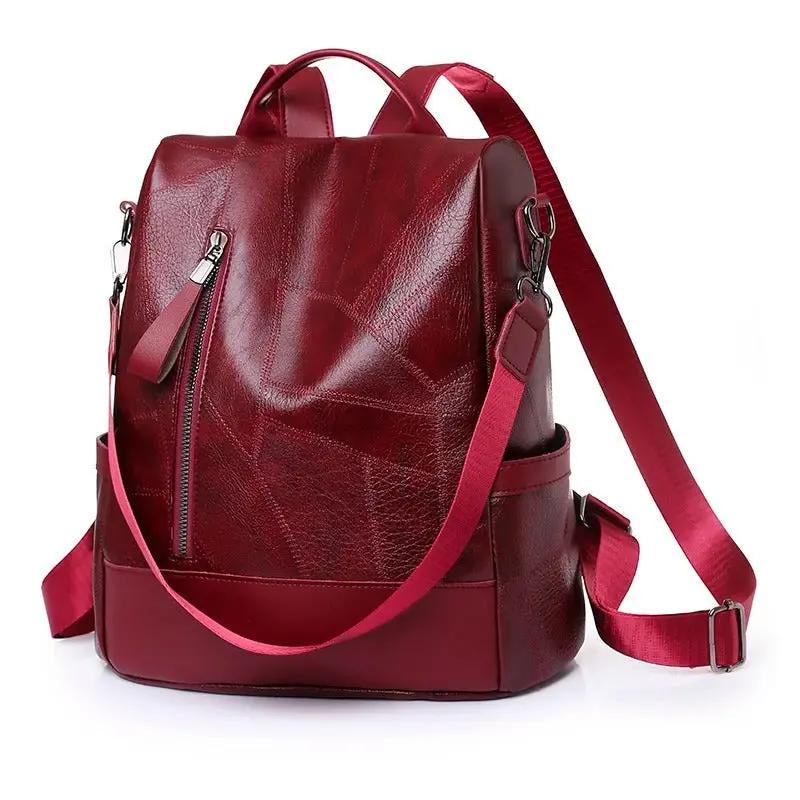 Sac à main Freya de Danoir Paris, rouge, en cuir, avec poches et poignées pour un usage quotidien et les aventures.