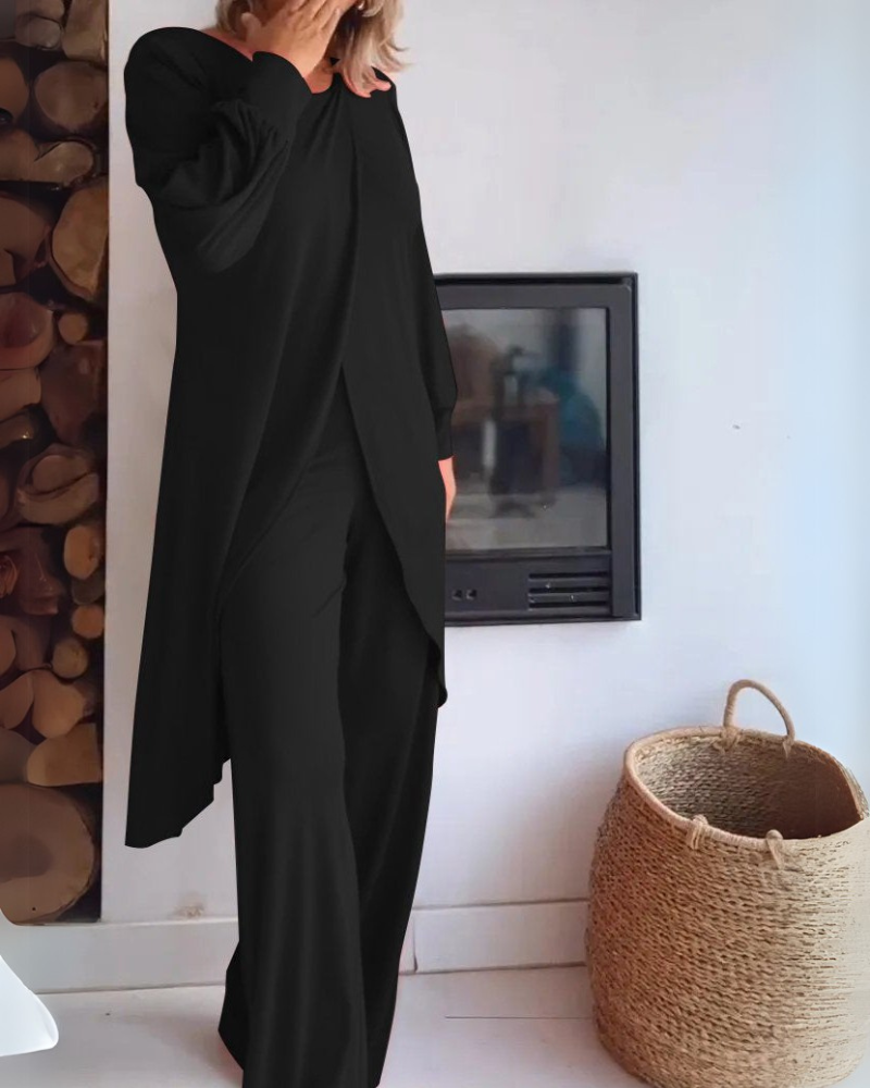 Ensemble élégant et douillet Adélaïde de Danoir Paris, veste rouge et pantalon assorti pour un look chic et confortable.