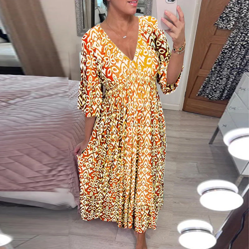 Robe évasée élégante Danoir Paris Mhara en rouge, tissu fluide, longueur mi-mollet, style féminin et sophistiqué.