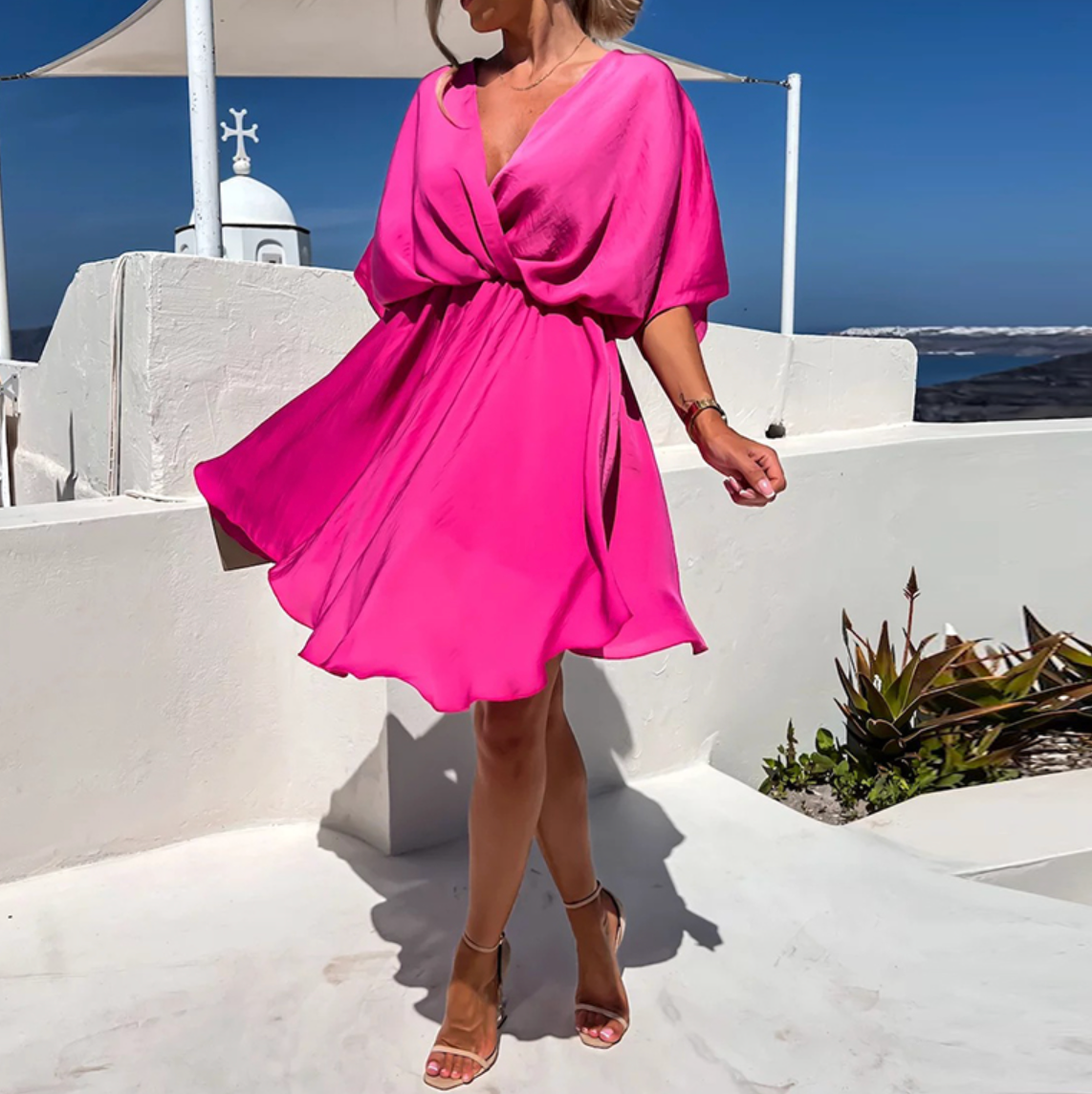 Robes élégantes Rose™ de Danoir Paris en tissu fluide, avec détails sophistiqués et coupe flatteuse pour un style chic.