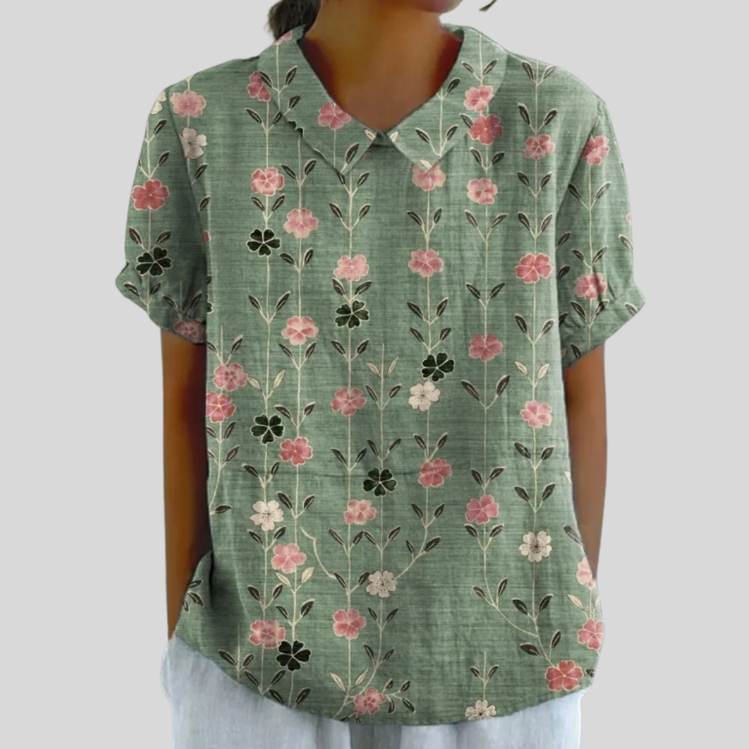 Blouse florale verticale Danoir Paris Amandine avec motifs colorés et manches longues, portée élégante et féminine.