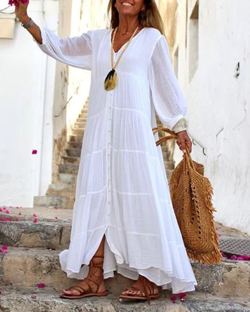 Robe d'été espagnole Solara blanche de Danoir Paris, léger tissu, style fluide, parfait pour la saison estivale.