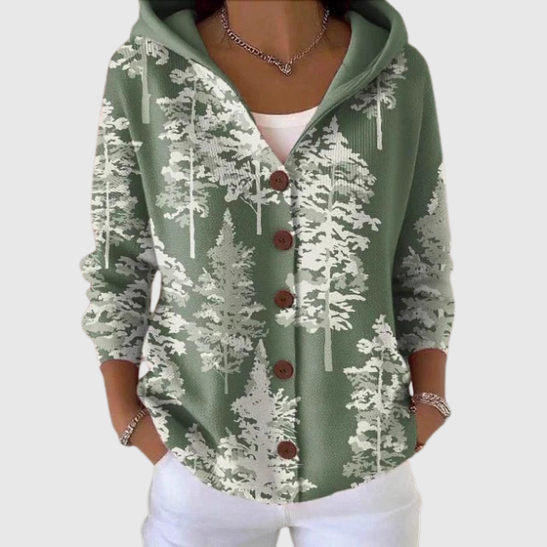 Cardigan Danoir Paris en maille avec capuche, confortable et décontracté, porté en extérieur, couleur gris clair.
