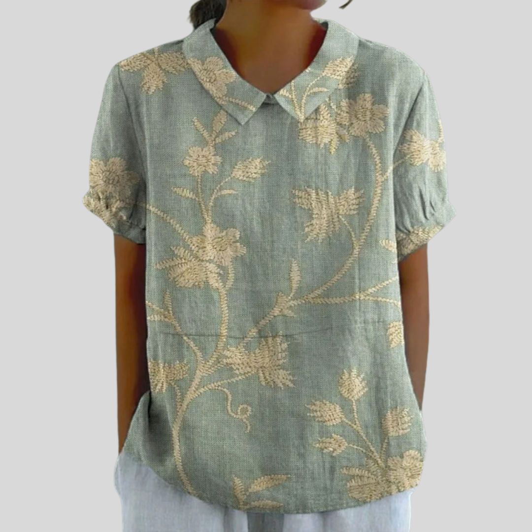 Blouse broderie végétale Célestine de Danoir Paris, en tissu léger avec motifs floraux délicats, vue de face.