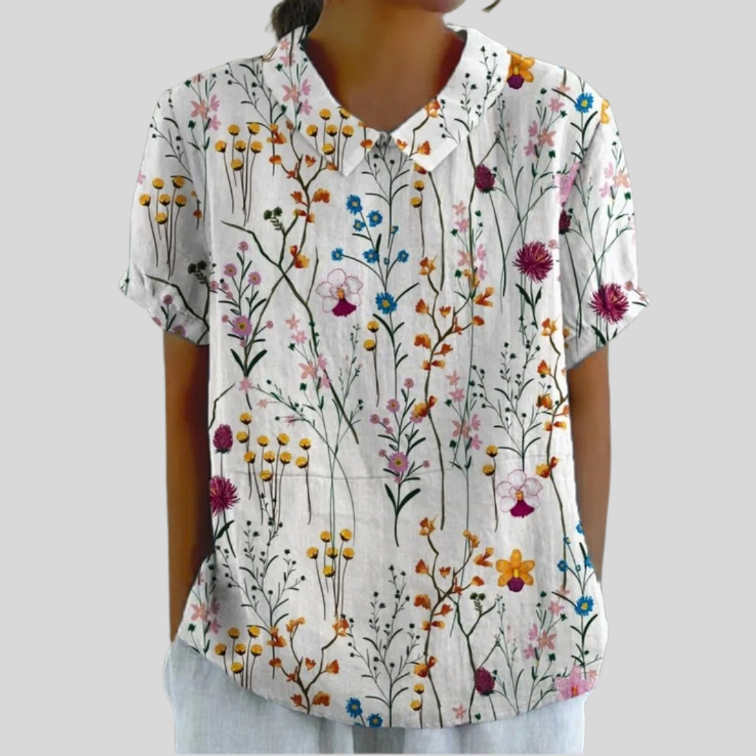 Blouse Éliane de Danoir Paris avec motif jardin sauvage, tissu léger et coupe fluide, idéale pour un style élégant et naturel.