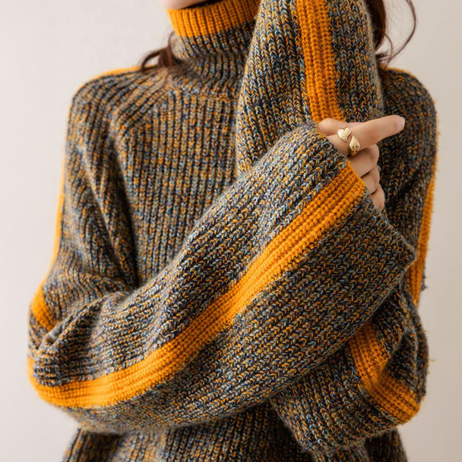 Pull Emily de Danoir Paris, élégant et confortable, en tissu doux, porté par une femme dans un cadre urbain.
