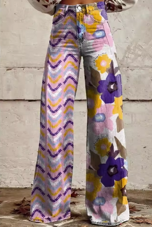 Pantaloni floreali boho Danoir Paris Isadora, léger et fluide, avec motif floral coloré et coupe décontractée.
