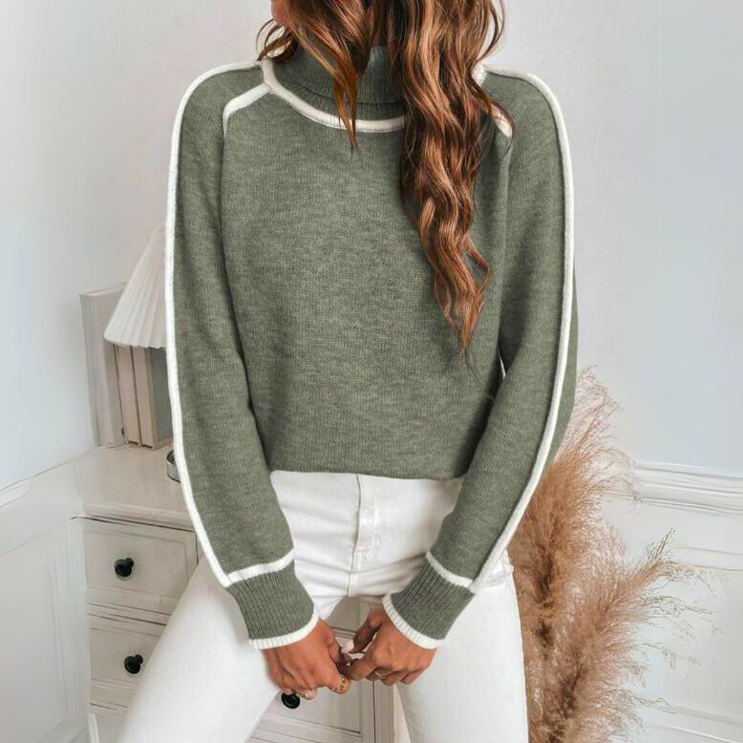 Pull roulé élégant Kaylee de Danoir Paris, en tissu doux, porté sur mannequin, couleur neutre, style chic et confortable.