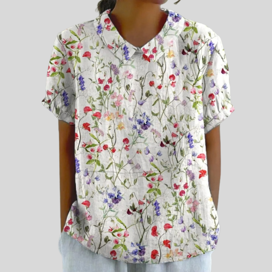 Blouse légère à fleurs Océane de Danoir Paris, tissu fluide, manches longues, style élégant et féminin.