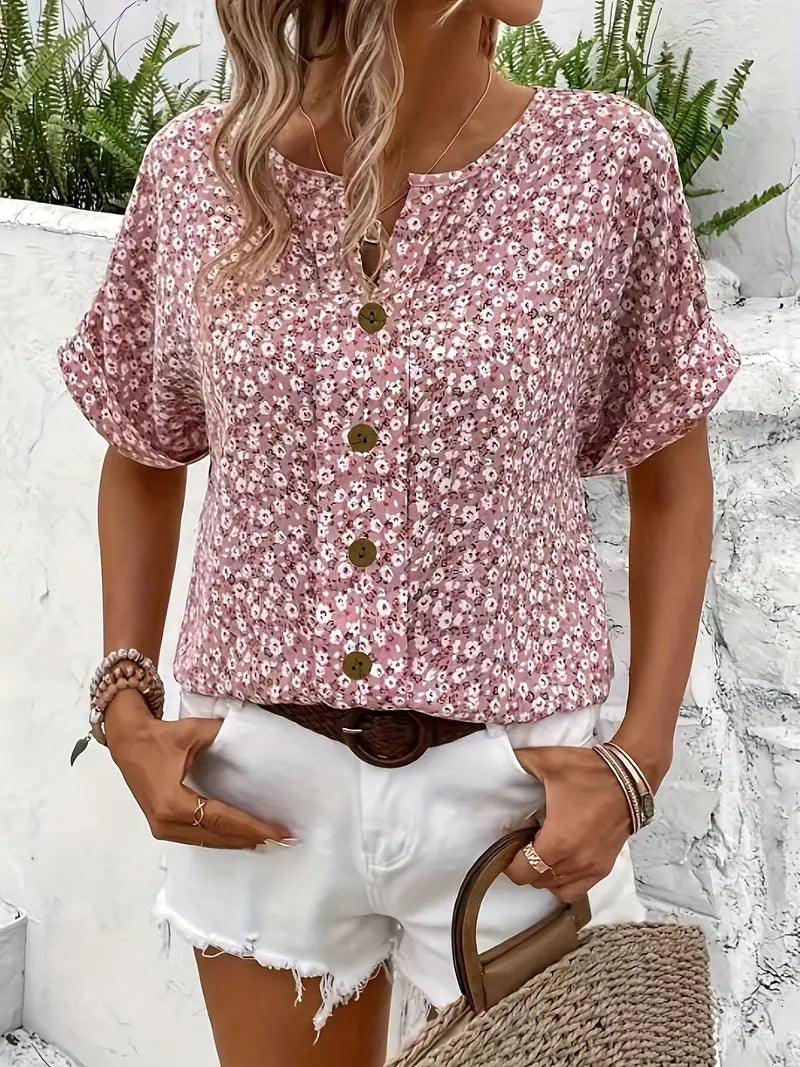 Haut floral estival Jelena de Danoir Paris, élégante blouse légère avec motif floral coloré, vue de face.