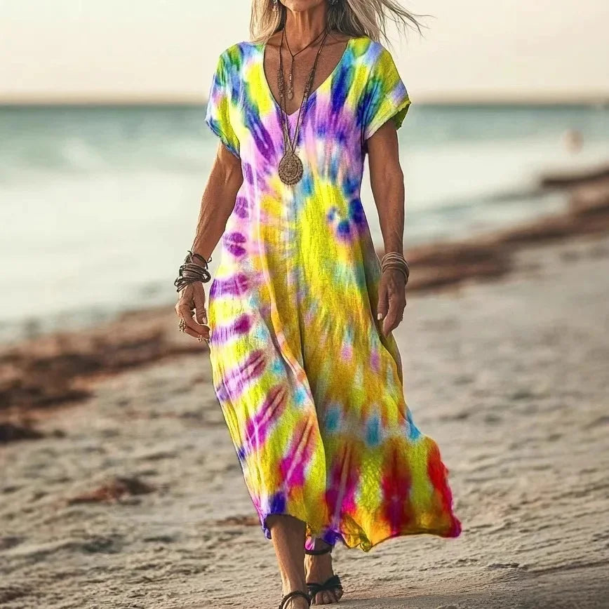 Robe longue Danoir Paris Isola à imprimés naturels et coupe aérienne, tissu léger et fluide, couleur jaune tie-dye.