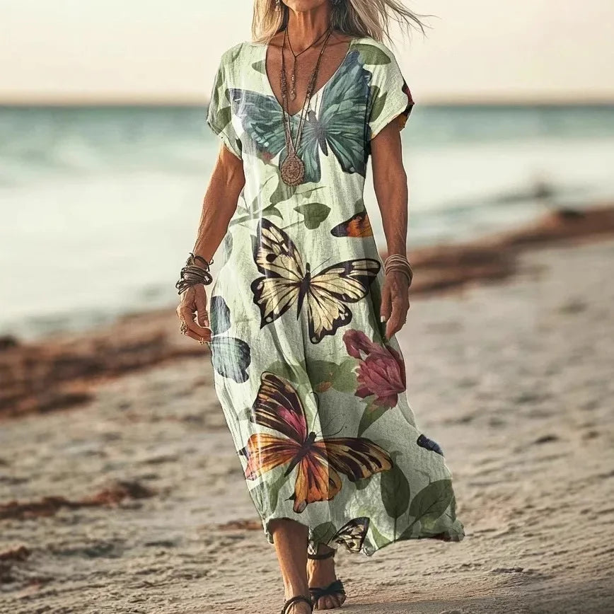 Robe longue Danoir Paris Isola à imprimés naturels, coupe aérienne et style tie-dye jaune, vêtement élégant et léger.