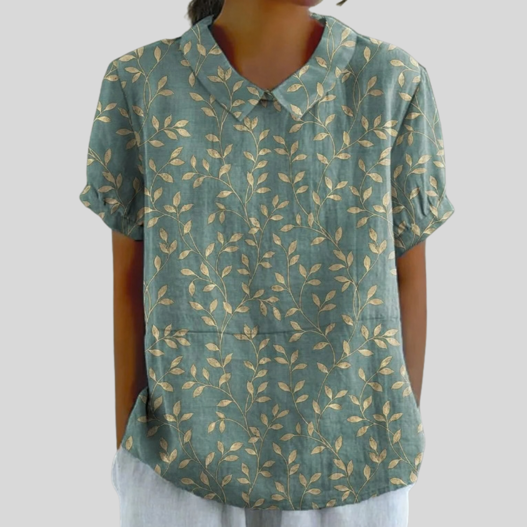 Blouse Valentine Danoir Paris en tissu feuillage élégant avec détails sophistiqués, portée en vue de face.